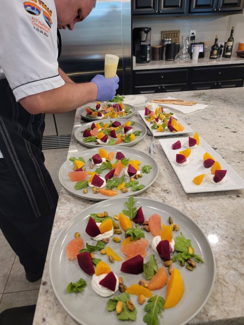 Chef Serving The Beet and Goat Cheese Salad